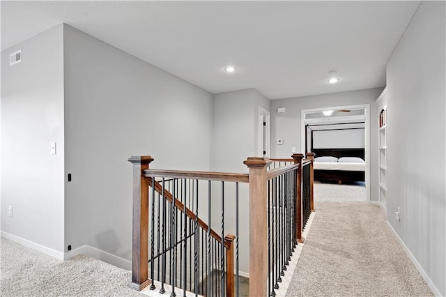 20487 W 108th St, Olathe, KS 66061 - corridor featuring an upstairs landing, carpet flooring, and recessed lighting
