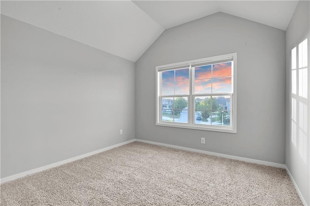 20487 W 108th St, Olathe, KS 66061 - carpeted empty room with lofted ceiling and baseboards