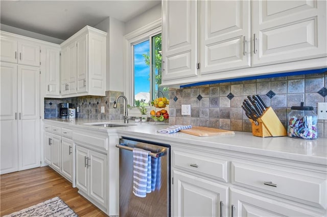 5010 W 161st Ter, Overland Park, KS 66085 - kitchen featuring dishwasher, white cabinetry, light countertops, and light wood-type flooring