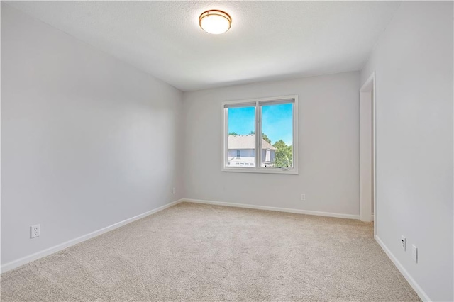 5010 W 161st Ter, Overland Park, KS 66085 - spare room with light colored carpet and baseboards