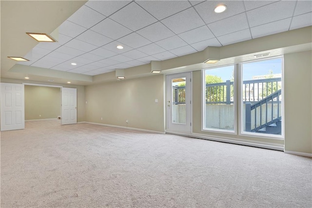 5010 W 161st Ter, Overland Park, KS 66085 - empty room featuring carpet floors, plenty of natural light, a paneled ceiling, and recessed lighting