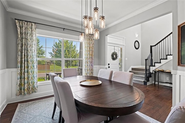 316 SE Hackamore Dr, Lees Summit, MO 64082 - dining room featuring wood finished floors, stairs, ornamental molding, and a wainscoted wall