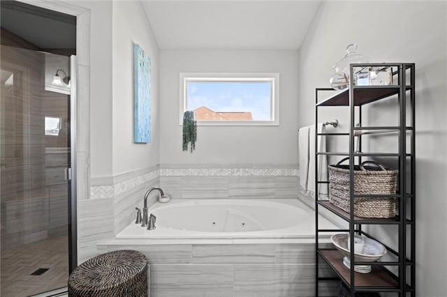 316 SE Hackamore Dr, Lees Summit, MO 64082 - full bath with a tub with jets, a stall shower, and vaulted ceiling