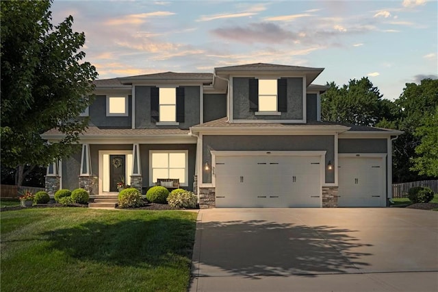 316 SE Hackamore Dr, Lees Summit, MO 64082 - prairie-style house with stone siding, concrete driveway, stucco siding, covered porch, and an attached garage