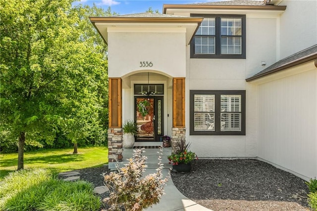 3536 SW Dana Ave, Lees Summit, MO 64082 - entrance to property featuring stucco siding and a yard