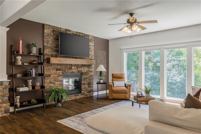 3536 SW Dana Ave, Lees Summit, MO 64082 - living room with a ceiling fan, a fireplace, and wood finished floors
