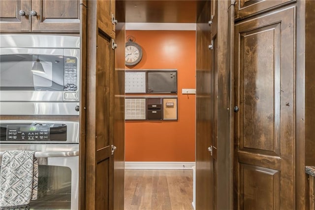 3536 SW Dana Ave, Lees Summit, MO 64082 - kitchen view of stainless steel appliances and wood finished floors