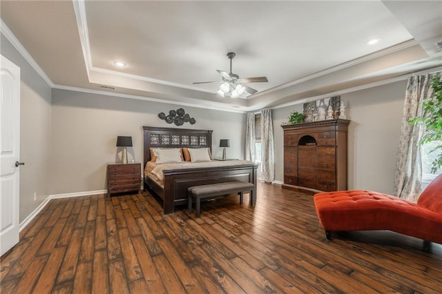3536 SW Dana Ave, Lees Summit, MO 64082 - bedroom featuring a tray ceiling, multiple windows, hardwood / wood-style flooring, crown molding, and recessed lighting