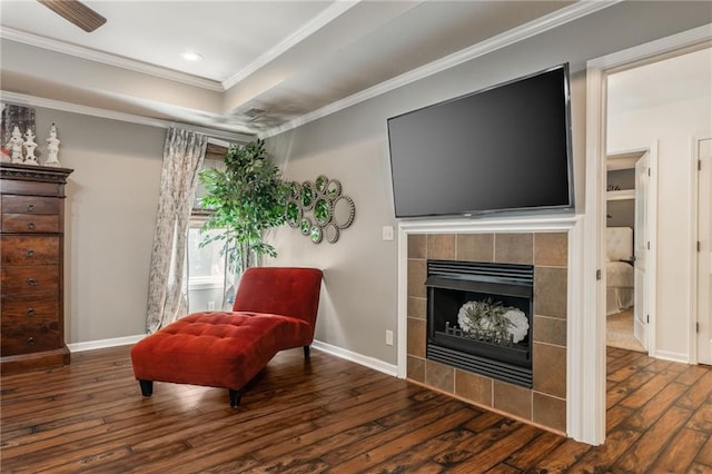 3536 SW Dana Ave, Lees Summit, MO 64082 - living area featuring hardwood / wood-style flooring, crown molding, a fireplace, recessed lighting, and a tray ceiling