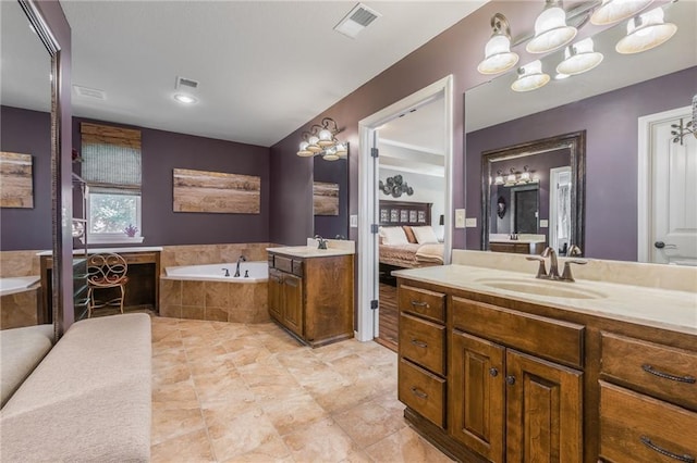 3536 SW Dana Ave, Lees Summit, MO 64082 - full bath with a bath, two vanities, connected bathroom, and tile patterned floors