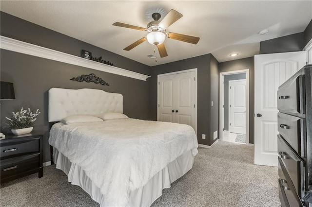 3536 SW Dana Ave, Lees Summit, MO 64082 - bedroom featuring light carpet, a closet, and ceiling fan
