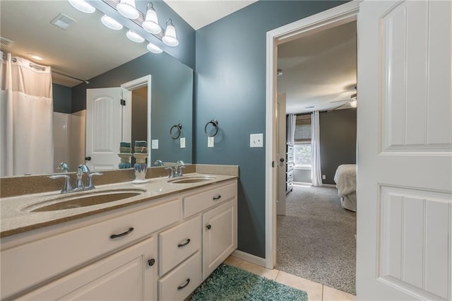 3536 SW Dana Ave, Lees Summit, MO 64082 - bathroom featuring double vanity, tile patterned flooring, and ceiling fan