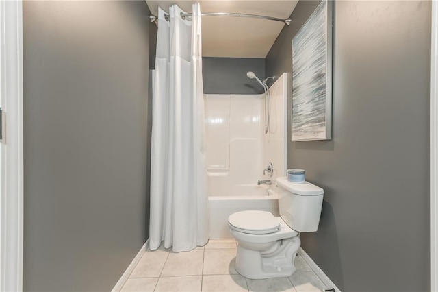 3536 SW Dana Ave, Lees Summit, MO 64082 - bathroom featuring tile patterned flooring and shower / tub combo