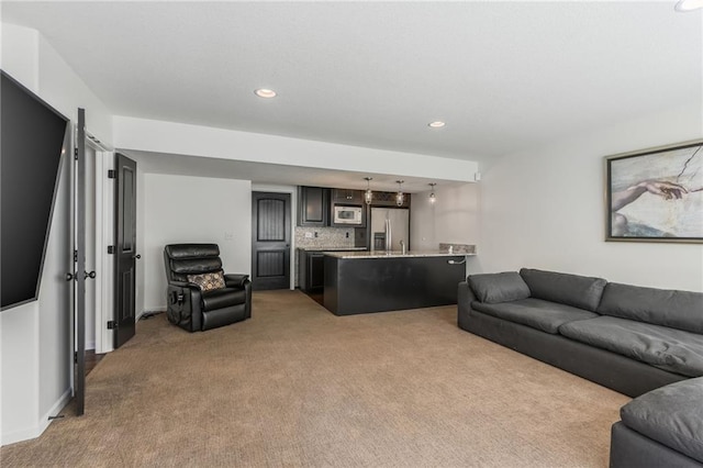 3536 SW Dana Ave, Lees Summit, MO 64082 - living room featuring light carpet and recessed lighting