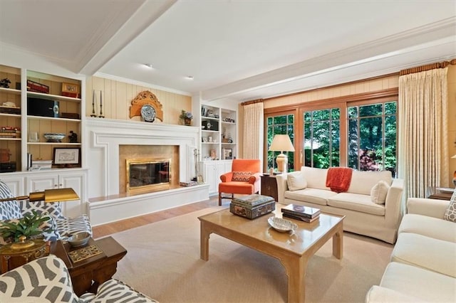 8422 Reinhardt Ln, Leawood, KS 66206 - living area featuring crown molding, beamed ceiling, a premium fireplace, built in features, and light wood-style floors