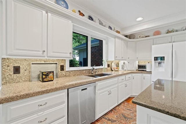 8422 Reinhardt Ln, Leawood, KS 66206 - kitchen featuring stainless steel dishwasher, white refrigerator with ice dispenser, white cabinetry, decorative backsplash, and ornamental molding