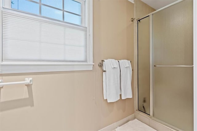 8422 Reinhardt Ln, Leawood, KS 66206 - full bathroom with a stall shower and baseboards