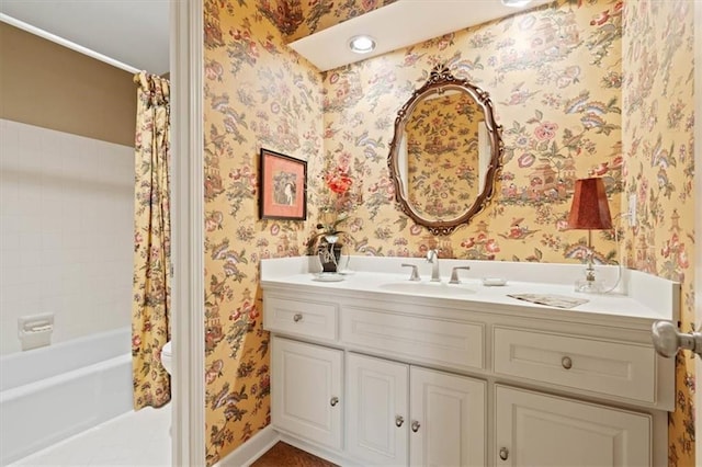 8422 Reinhardt Ln, Leawood, KS 66206 - bathroom featuring vanity, wallpapered walls, and shower / tub combo with curtain