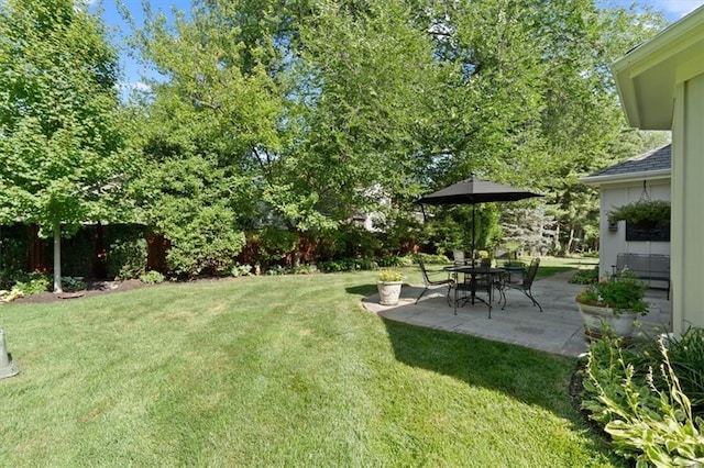 8422 Reinhardt Ln, Leawood, KS 66206 - view of green lawn with a patio
