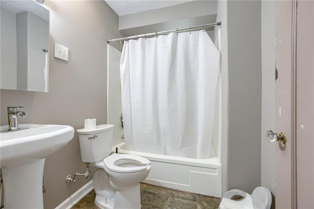 3509 Bellefontaine Ave, Kansas City, MO 64128 - bathroom featuring toilet and shower / tub combo