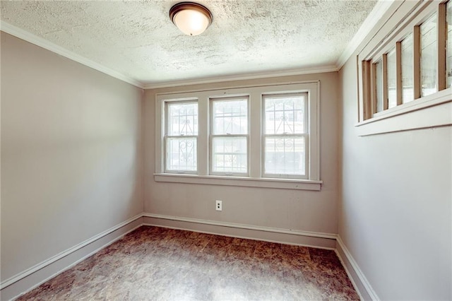 3509 Bellefontaine Ave, Kansas City, MO 64128 - spare room with a textured ceiling, ornamental molding, and carpet floors