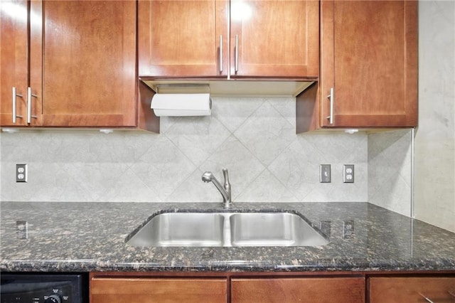 600 E Admiral Blvd Unit 1703, Kansas City, MO 64106 - kitchen featuring backsplash, dark stone counters, dishwasher, and brown cabinets