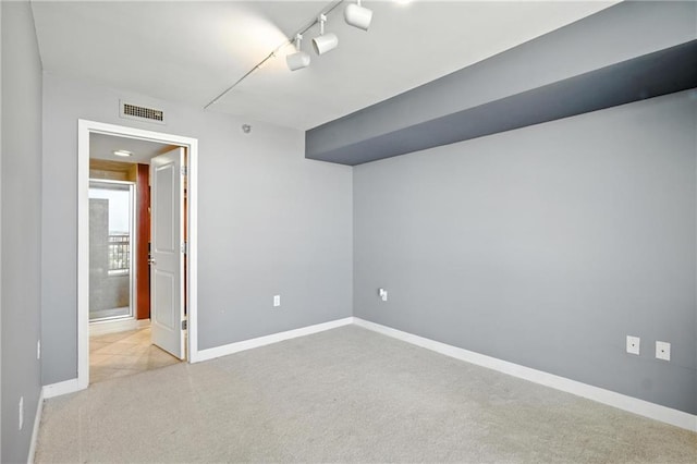 600 E Admiral Blvd Unit 1703, Kansas City, MO 64106 - empty room with baseboards and carpet flooring