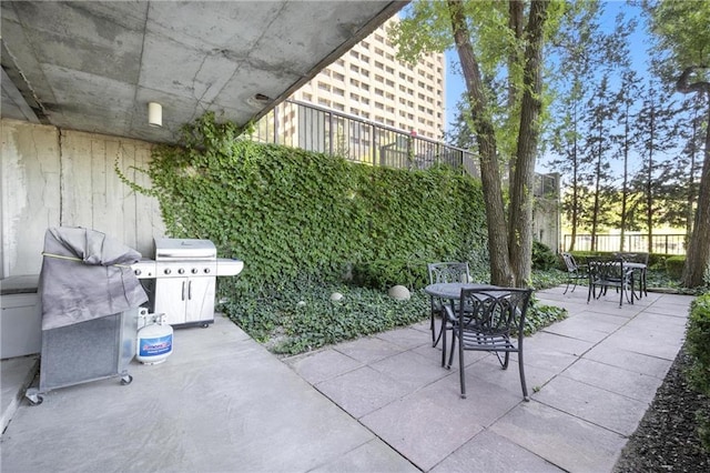 600 E Admiral Blvd Unit 1703, Kansas City, MO 64106 - view of patio / terrace with outdoor dining space and grilling area