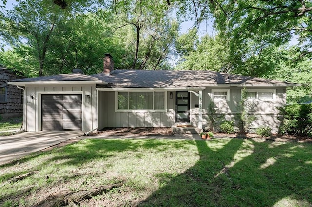6015 W 78th Ter, Prairie Village, KS 66208 - single story home featuring a chimney, an attached garage, a front lawn, and driveway