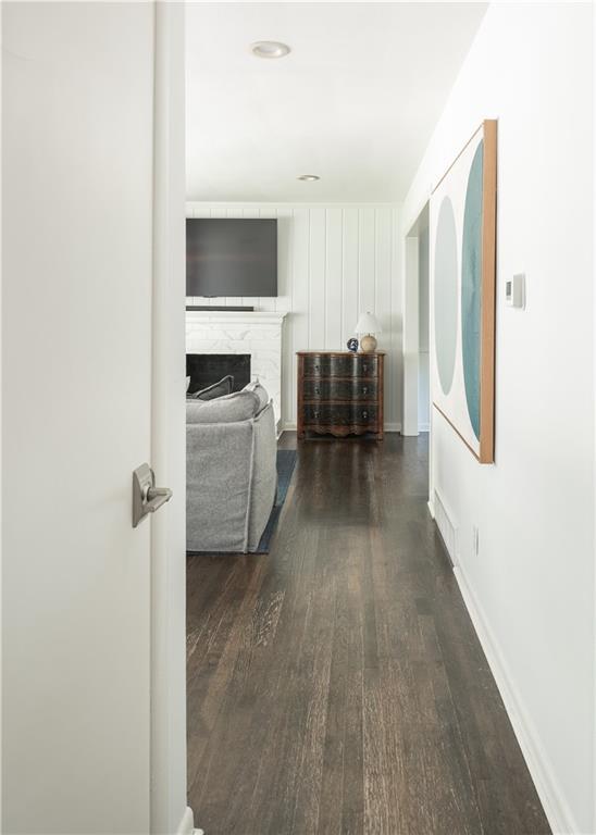 6015 W 78th Ter, Prairie Village, KS 66208 - hallway with dark wood finished floors and baseboards