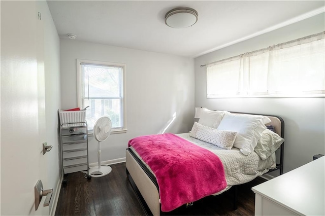 6015 W 78th Ter, Prairie Village, KS 66208 - bedroom with dark wood-type flooring and baseboards