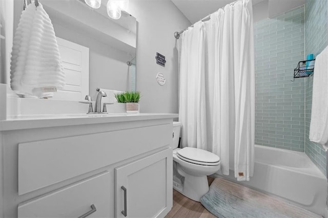 118 NW Grady Ct, Lees Summit, MO 64081 - bathroom featuring vanity, shower / tub combo with curtain, and wood finished floors