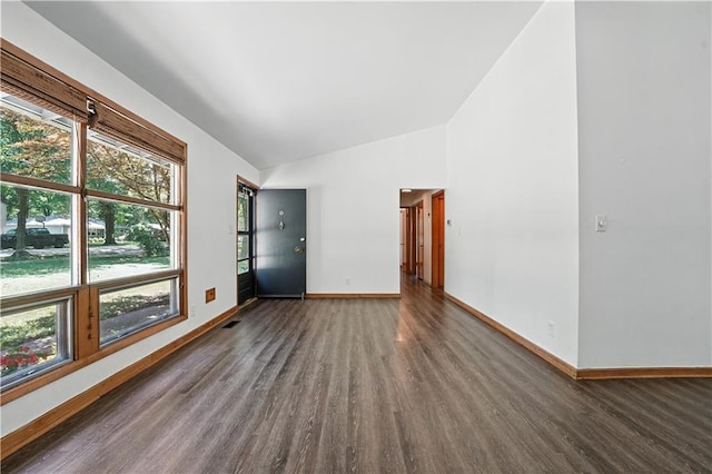 7604 Tomahawk Rd, Prairie Village, KS 66208 - unfurnished room featuring dark wood-type flooring, lofted ceiling, and plenty of natural light