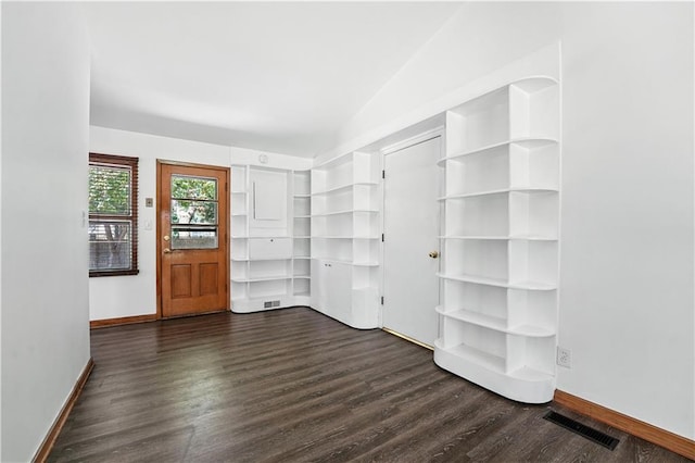 7604 Tomahawk Rd, Prairie Village, KS 66208 - empty room featuring dark wood finished floors and vaulted ceiling
