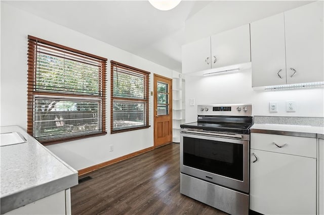 7604 Tomahawk Rd, Prairie Village, KS 66208 - kitchen featuring stainless steel electric stove, dark wood finished floors, white cabinetry, and light countertops