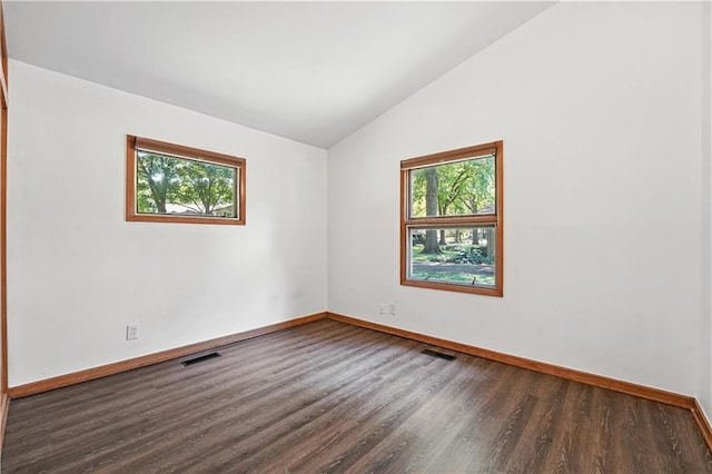 7604 Tomahawk Rd, Prairie Village, KS 66208 - spare room with wood finished floors and vaulted ceiling