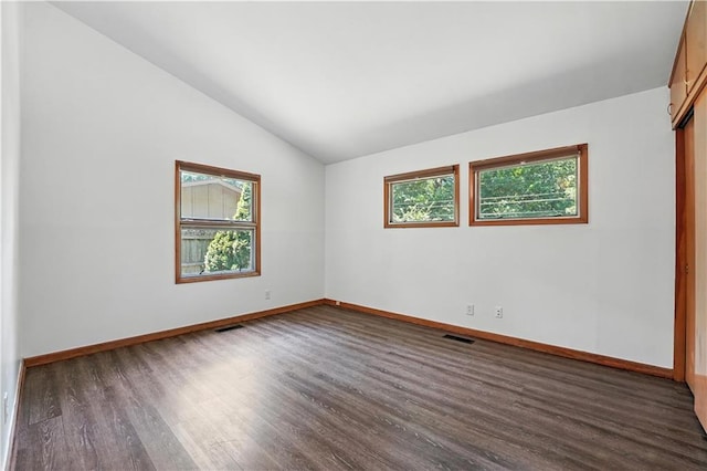7604 Tomahawk Rd, Prairie Village, KS 66208 - empty room featuring wood finished floors and vaulted ceiling