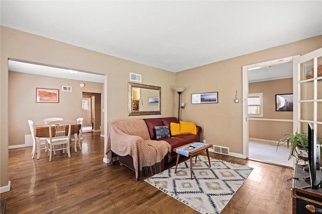 6016 Harrison St, Kansas City, MO 64110 - living area with wood finished floors