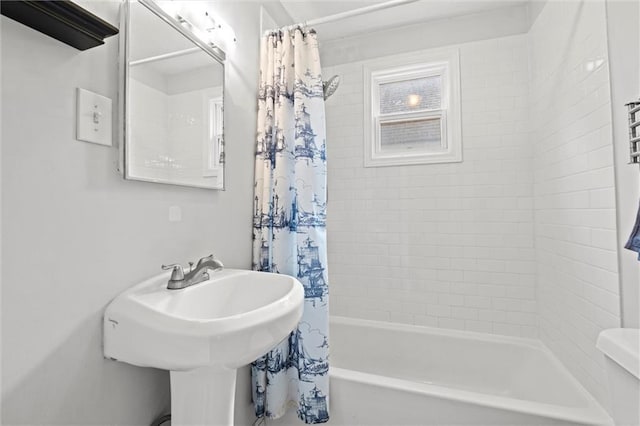 6016 Harrison St, Kansas City, MO 64110 - full bathroom with shower / tub combo and a sink