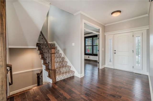 16699 S Chalet Dr, Olathe, KS 66062 - foyer entrance featuring wood-type flooring, stairs, and ornamental molding