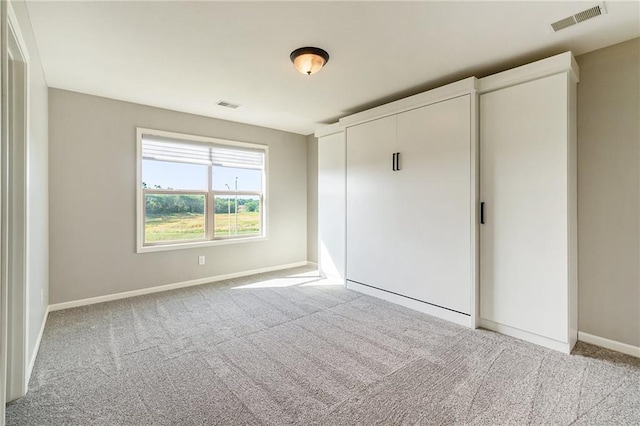 16699 S Chalet Dr, Olathe, KS 66062 - unfurnished bedroom with carpet flooring and a closet
