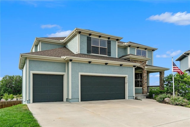 16699 S Chalet Dr, Olathe, KS 66062 - prairie-style home with driveway, stucco siding, and roof with shingles
