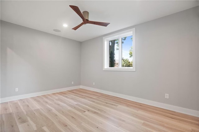 2616 W 112th St, Leawood, KS 66211 - empty room featuring light wood-type flooring, ceiling fan, and recessed lighting