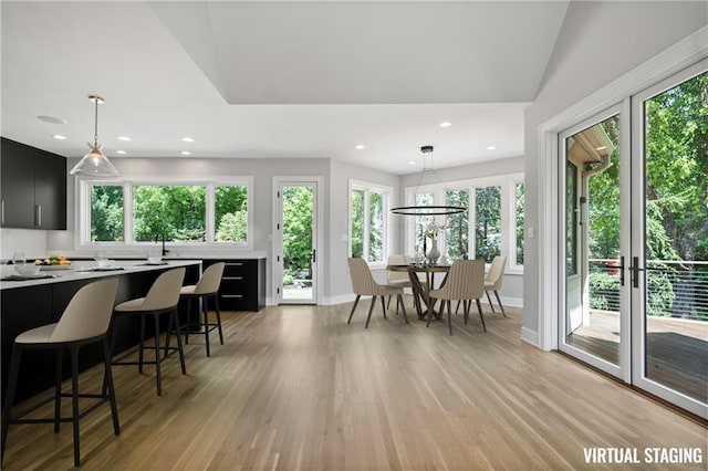 2616 W 112th St, Leawood, KS 66211 - dining room featuring light wood-style flooring and recessed lighting