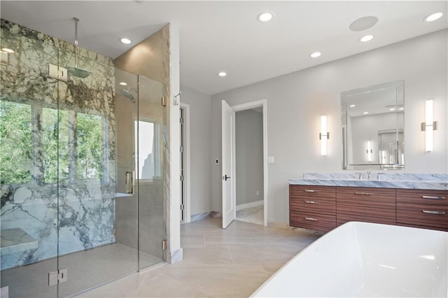 2616 W 112th St, Leawood, KS 66211 - full bathroom with vanity, a marble finish shower, a freestanding bath, and recessed lighting