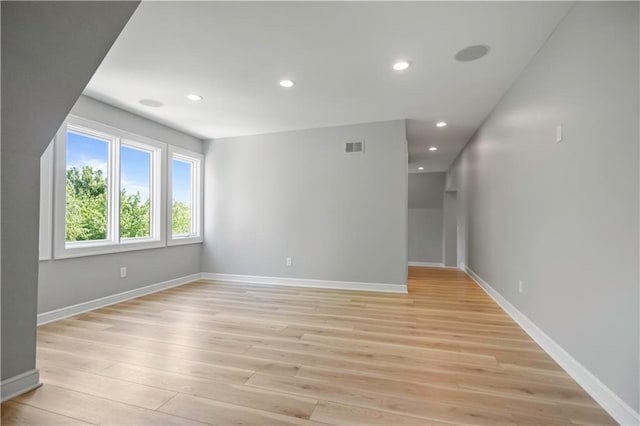 2616 W 112th St, Leawood, KS 66211 - unfurnished room with light wood finished floors and recessed lighting