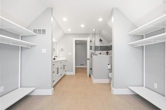 2616 W 112th St, Leawood, KS 66211 - spacious closet with lofted ceiling and light carpet
