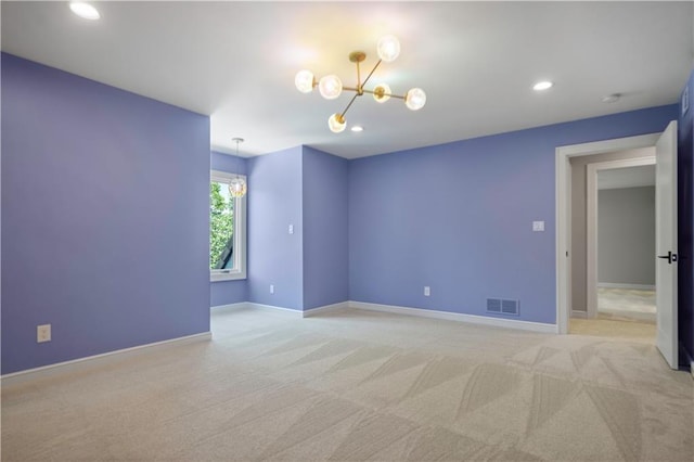 2616 W 112th St, Leawood, KS 66211 - spare room featuring a chandelier, light carpet, and recessed lighting