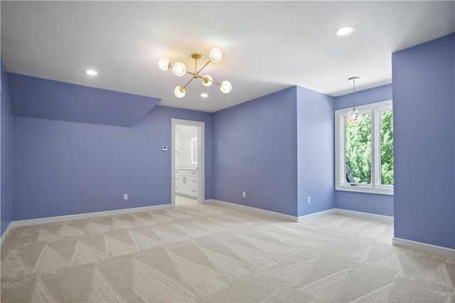 2616 W 112th St, Leawood, KS 66211 - empty room featuring light carpet, a chandelier, and recessed lighting
