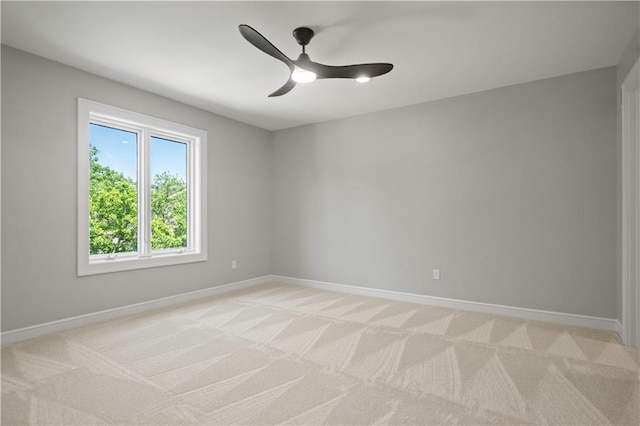 2616 W 112th St, Leawood, KS 66211 - spare room featuring light carpet and ceiling fan
